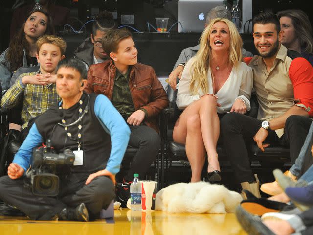 <p>Allen Berezovsky/Getty</p> Sean Federline, Jayden James Federline, Britney Spears and Sam Asghari at a basketball game between the Los Angeles Lakers and the Golden State Warriors at Staples Center on November 29, 2017.