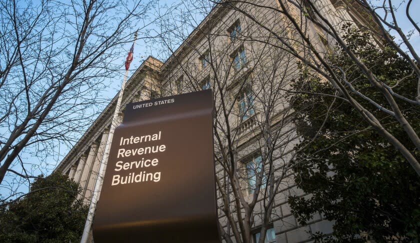FILE - This April 13, 2014, file photo, shows the Internal Revenue Service headquarters building in Washington. A federal judge says it&#39;s likely that Microsoft was trying to avoid or evade paying U.S. taxes and is ordering the company to hand over financial documents from more than a decade ago. (AP Photo/J. David Ake, File)