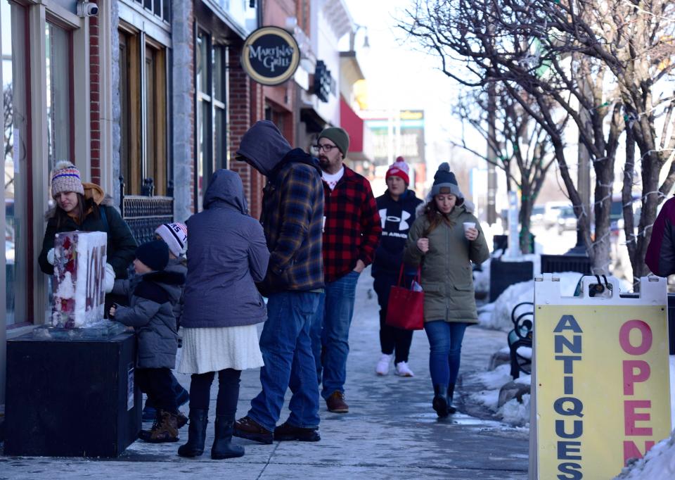 Crowds of visitors walked through downtown on Saturday, Jan. 29, 2022, during Chilly Fest in Port Huron.
