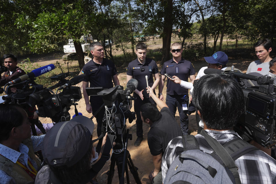 Ukrainian deminers hold a press briefing during a visit to the Peace Museum Mine Action in Siem Reap province, northwestern Cambodia, Friday, Jan. 20, 2023. Cambodian experts, whose country has the dubious distinction of being one of the world's most contaminated by landmines, walked a group of Ukrainian soldiers through a minefield being actively cleared hoping their decades of experience will help the Europeans in their own efforts to remove Russian mines at home. (AP Photo/Heng Sinith)