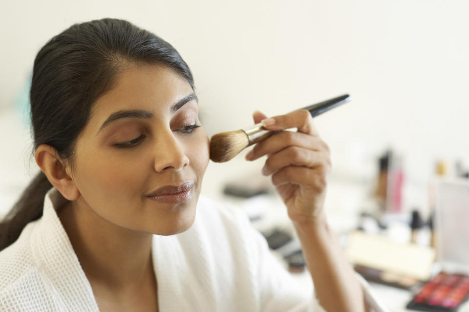 someone applying makeup