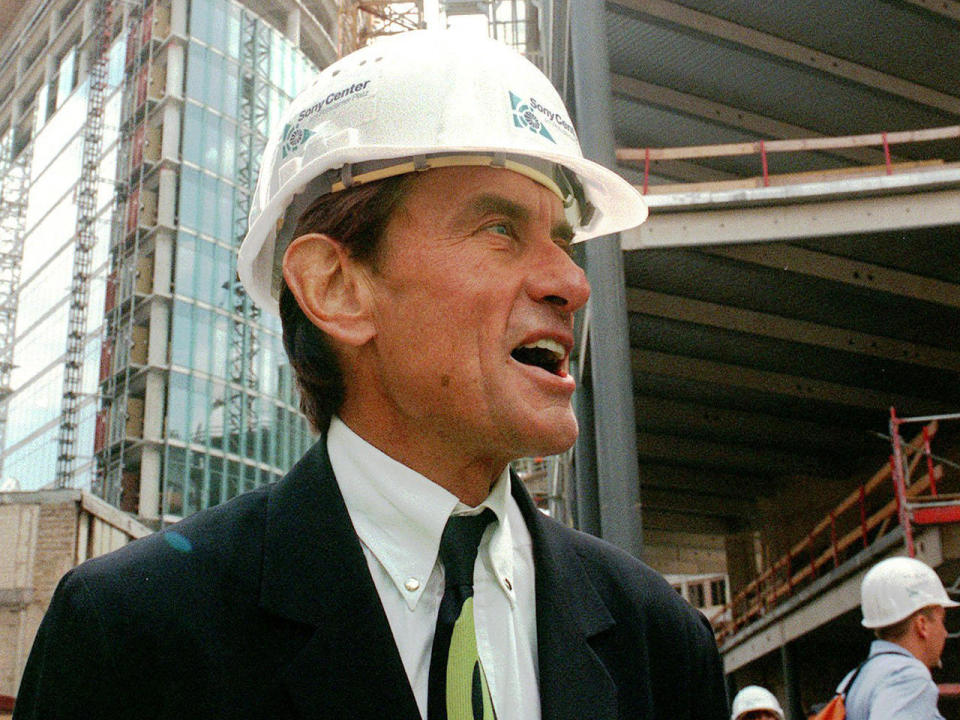 Architect Helmut Jahn tours a construction site in Berlin in this July 15, 1998 file photo. / Credit: Jockel Finck/AP