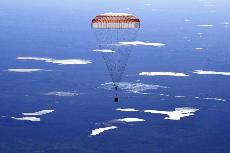 Soyuz MS-02 space capsule over the water