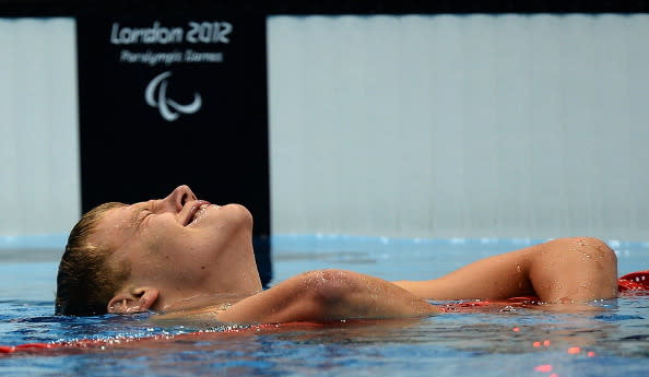 Jon Margeir Sverrisson of Iceland celebrates after winning the gold in the Men's 200m Freestyle - S14 final on day 4 of the London 2012 Paralympic Games at Aquatics Centre on September 2, 2012 in London, England. (Photo by Christopher Lee/Getty Images)