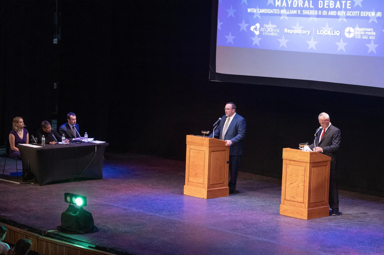 Canton mayoral candidates William V. Sherer II, left, and Roy Scott DePew answer questions during the The Future of Canton: 2023 Mayoral Debate on Tuesday at the Cultural Center Theater in Canton.