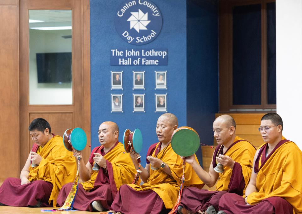 Tibetan monks chant during a visit to Canton Country Day School as part of a five-day tour in Canton hosted by Yoga Central.