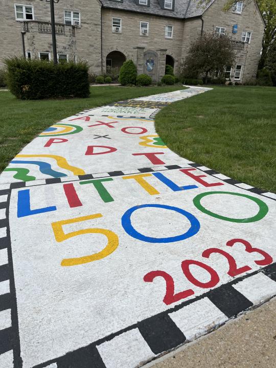 Walkways at Greek houses painted in support of their fraternity and sorority teams