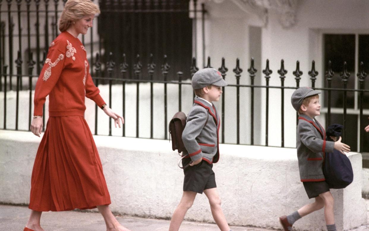 Diana, Princess of Wales following her sons Prince Harry (right), then five years old, and Prince William, then seven, on Harry's first day at the Wetherby School in Notting Hill, West London, in 1989  - PA