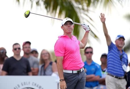 Rory McIlroy reacts to his tee shot on the second hole hole during the third round of the WGC - Cadillac Championship golf tournament at TPC Blue Monster at Trump National Doral. Mandatory Credit: Jason Getz-USA TODAY Sports