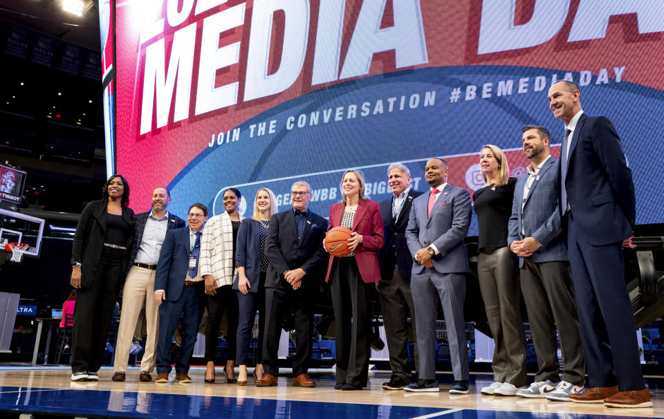 Big East Commissioner Val Ackerman poses with conference head coaches of women's basketball teams during the Big East NCAA college basketball media day at Madison Square Garden in New York Tuesday, Oct. 24, 2023. (AP Photo/Craig Ruttle)