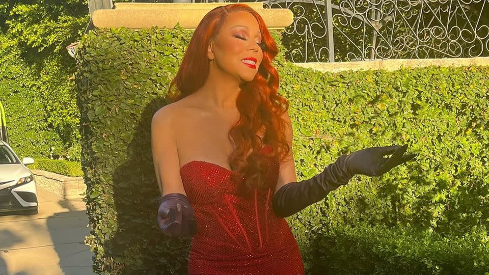 Mariah Carey wore the trademark sultry red of Jessica Rabbit. - From Mariah Carey