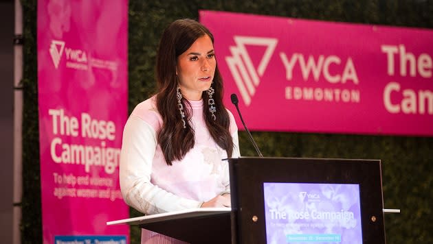 YWCA Edmonton board member Michelle Okere, who is also the chair of its Truth and Reconciliation Committee, speaks during the annual Rose Campaign Breakfast on Dec. 5.