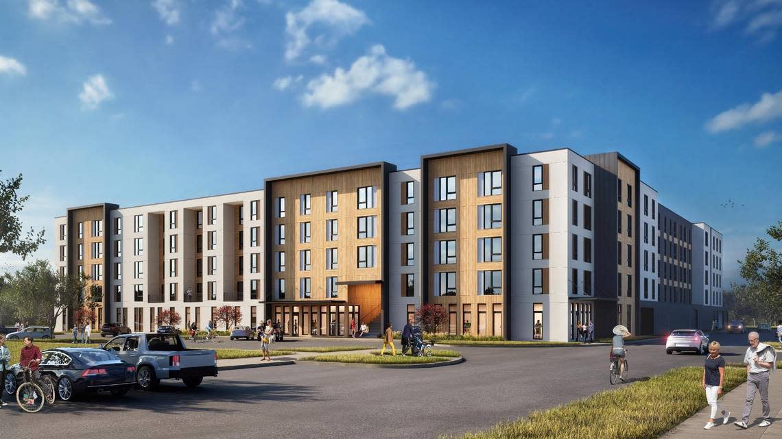 This architect’s rendering shows a view of the 193-apartment building from a private drive next to the apartments.