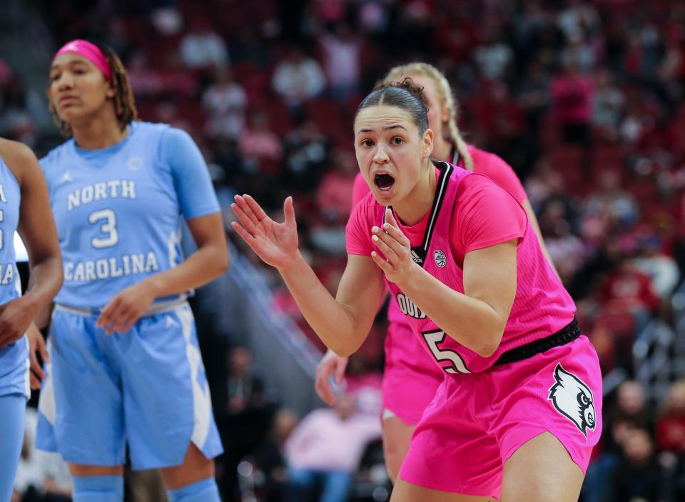 U of L’s Mykasa Robinson (5) celebrated a defensive stop against North Carolina during their game at the Yum Center in Louisville, Ky. on Feb. 5, 2023.  U of L defeated No. 11 ranked UNC 62-55.  