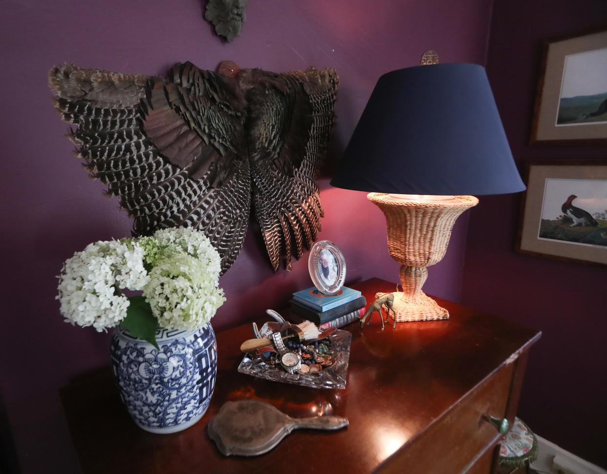 The top of a dresser, that was given to him by an aunt and uncle, in the bedroom of Jason Jennings’ apartment on Sherwood Ave. June 14, 2024