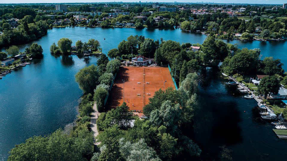 Tennispark, Lommerrijk in Rotterdam, The Netherlands has four clay courts on a promontory overlooking the Berge Achterplas wetlands. - Nick Pachelli