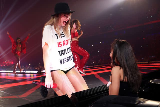 <p>Kevin Mazur/Getty</p> Taylor Swift wearing Ashish Gupta at the Eras Tour