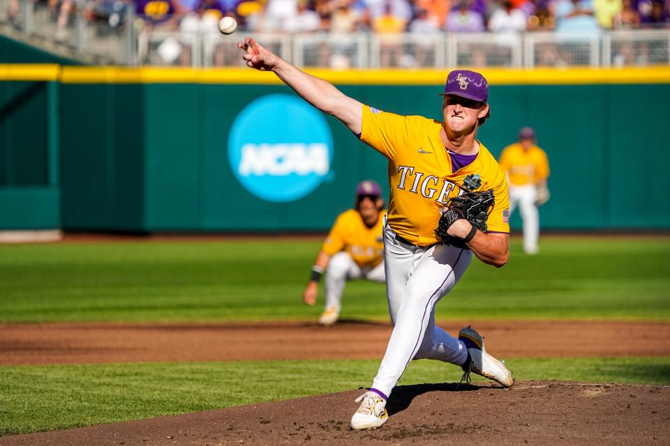 LSU starting pitcher Thatcher Hurd (26) throws against the Florida Gators during Game 3 of the College World Series final.