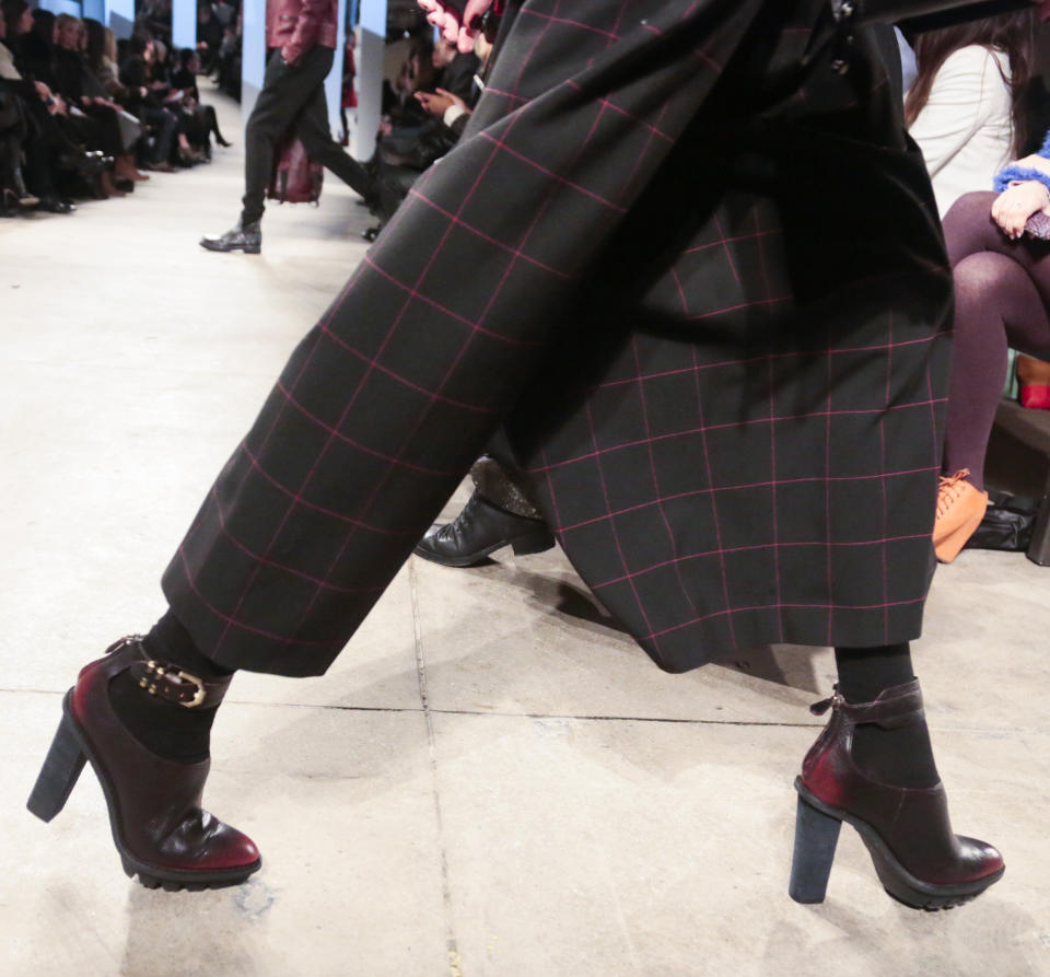 Fashion from the Kenneth Cole Fall 2014 collection is modeled, during New York Fashion Week on Monday, Feb. 10, 2014. (AP Photo/Bebeto Matthews)