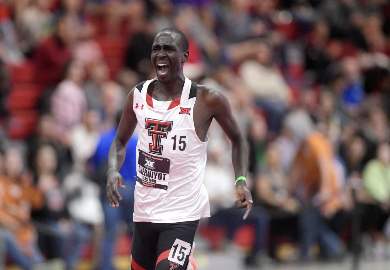 Texas Tech’s Ernest Cheruiyot reacts to his first place win during the 5,000 meters at the Big 12 indoor track and field meet, Friday, Feb. 23, 2024, at the Sports Performance Center.