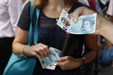 Sterling hits day’s highs after UK jobs report