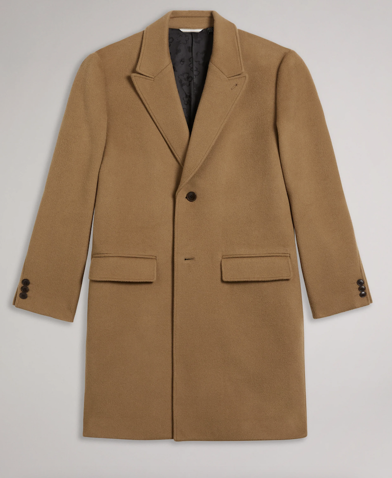 <p><a href="https://www.tedbaker.us/products/raydon-263574-pure-wool-single-breasted-overcoat?variant=46579257409826¤cy=USD&gclid=Cj0KCQiAuqKqBhDxARIsAFZELmJfkOTMr754YVm4B4ptUoVWrF0VsUBjWTsPPPrBOnOS9zZhvgnsEywaAhlnEALw_wcB" rel="nofollow noopener" target="_blank" data-ylk="slk:Shop Now;elm:context_link;itc:0;sec:content-canvas" class="link ">Shop Now</a></p><p>Pure Wool Single Breasted Overcoat</p><p>tedbaker.com</p><p>$322.00</p>