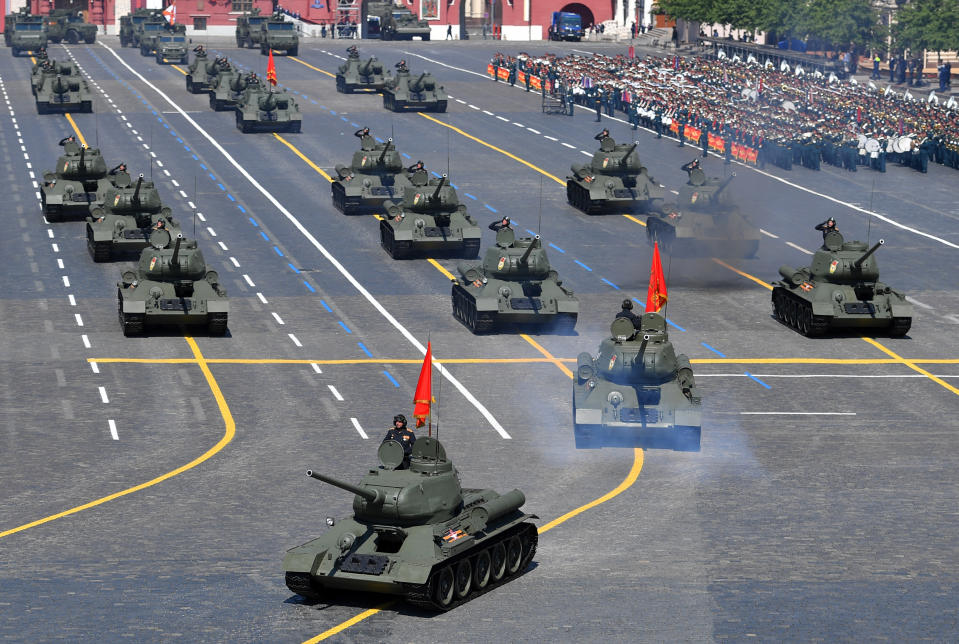 Soviet tanks T-34 roll toward Red Square during the Victory Day military parade marking the 75th anniversary of the Nazi defeat in Moscow, Russia, Wednesday, June 24, 2020. The Victory Day parade normally is held on May 9, the nation's most important secular holiday, but this year it was postponed due to the coronavirus pandemic. (Vladimir Pesnya, Host Photo Agency via AP)