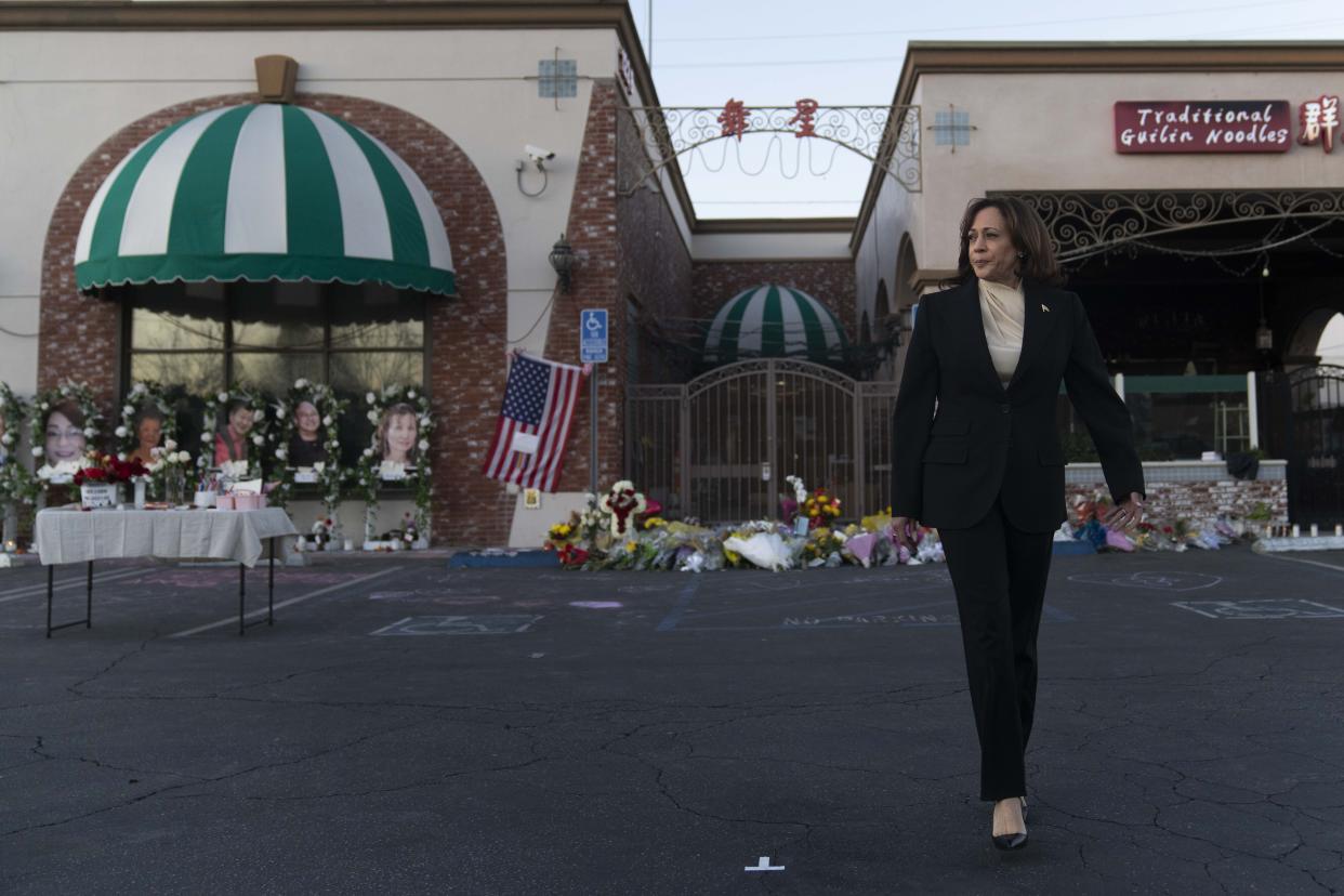 Vice President Kamala Harris walks toward the media after laying flowers at a memorial set up outside Star Dance Studio in Monterey Park, Calif., Wednesday, Jan. 25, 2023, to honor the victims killed in last week's mass shooting. (AP Photo/Jae C. Hong)