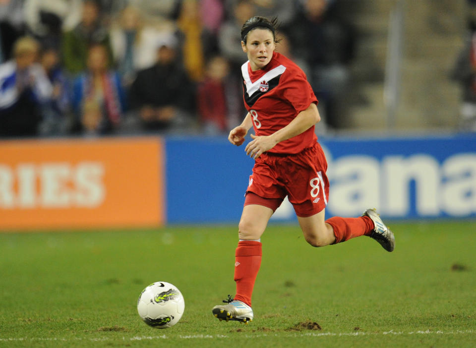 KANSAS CITY, KS - SEPTEMBER 17: Mid-fielder Diana Matheson #8 of Canada brings the ball up field against the United States during the second half on September 17, 2011 at LiveStrong Sporting Park in Kansas City, Kansas. (Photo by Peter Aiken/Getty Images)