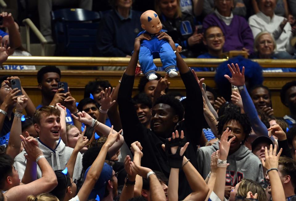 Oct 20, 2023; Durham, NC, USA; Duke Blue Devils recruit Patrick Ngongba cheers with students during Countdown to Craziness at Cameron Indoor Stadium. Mandatory Credit: Rob Kinnan-USA TODAY Sports