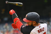 Washington Nationals' Keibert Ruiz loses his bat on the third strike for the last out of the first inning of a baseball game against the Toronto Blue Jays, Sunday, May 5, 2024, in Washington. (AP Photo/John McDonnell)