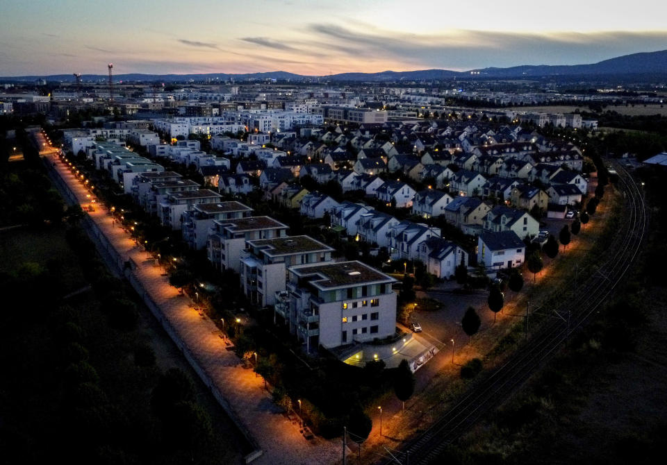 Apartment houses and detached houses that are heated with gas are pictured in a living area in Frankfurt, Germany, late Tuesday, July 12, 2022. (AP Photo/Michael Probst)