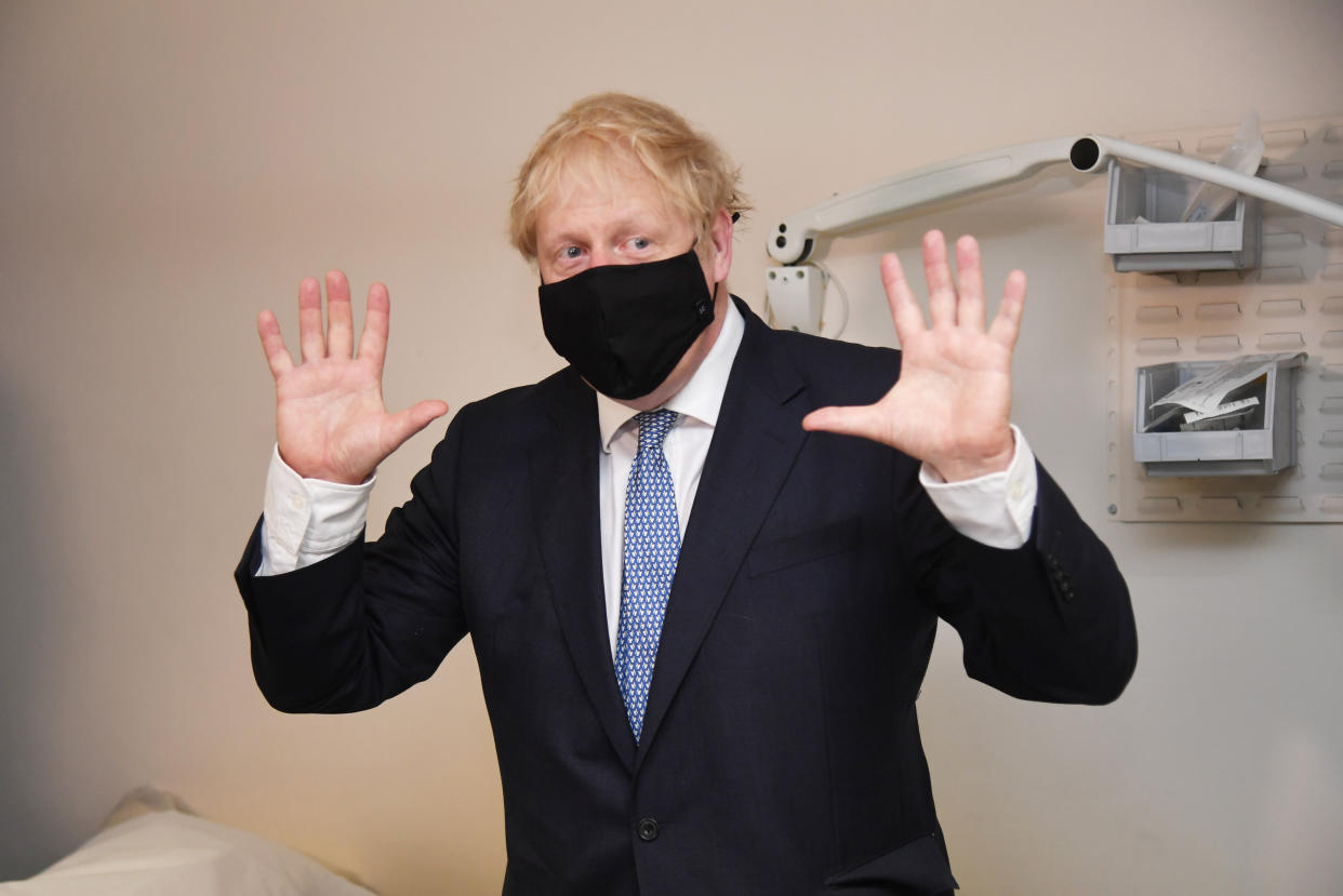 LONDON, ENGLAND - JULY 24:  Prime minister Boris Johnson wears a face mask as he visits Tollgate Medical Centre in Beckton on July 24, 2020 in London, England. (Photo by Jeremy Selwyn - WPA Pool/Getty Images)