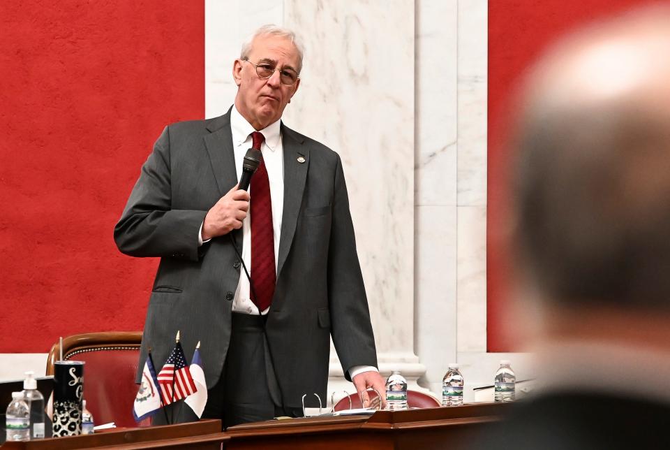 In this photo provided by West Virginia Legislative Services, state Sen. Charles Trump stands in the Senate chambers in Charleston, W.Va., Friday, March 10, 2023.