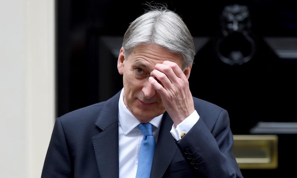 Philip Hammond leaves 11 Downing Street to deliver his autumn budget speech