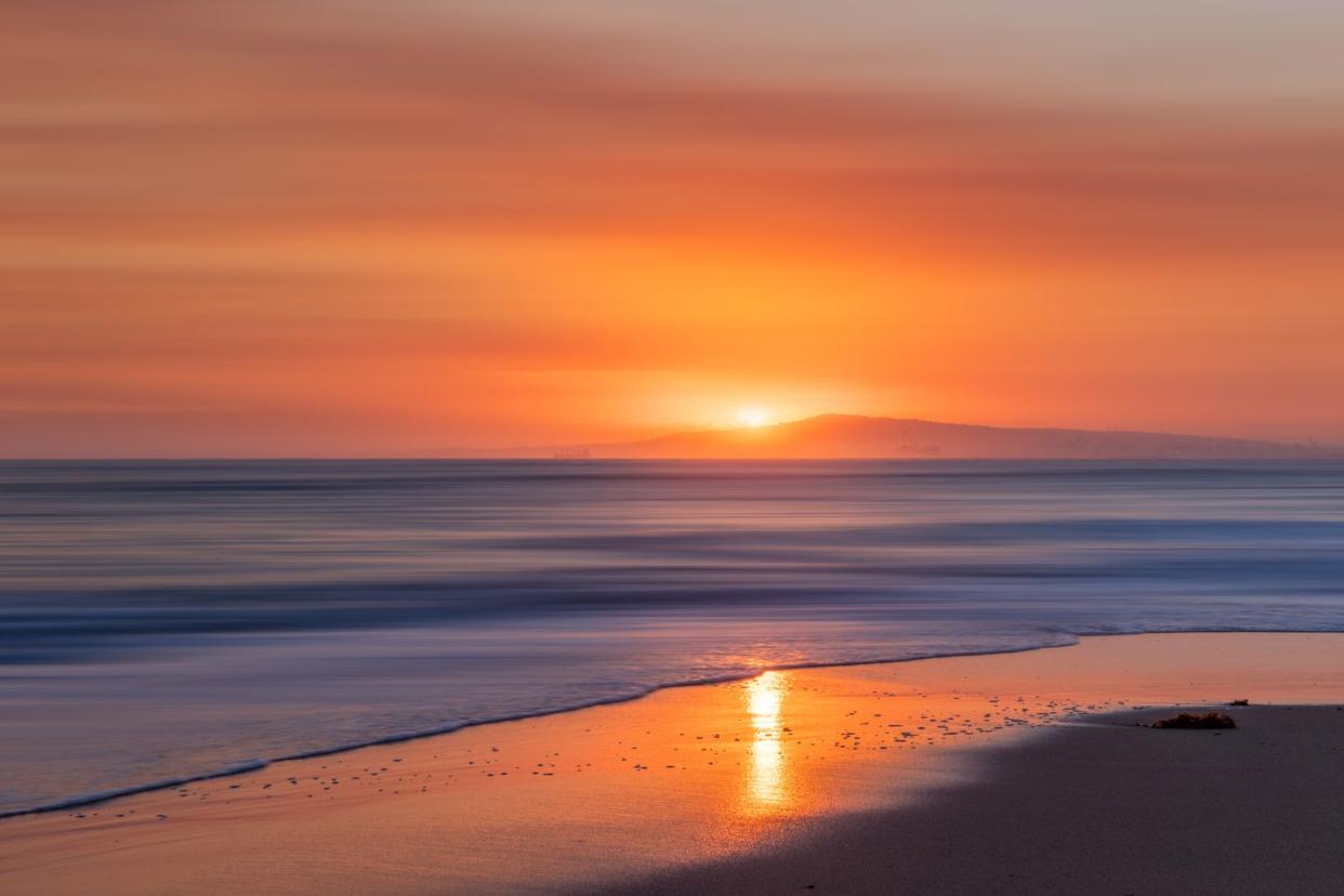 scenic view of sea against sky during sunset,huntington beach state park,united states,usa