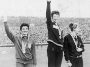 <p>British runner Ann Packer (center) wins gold for the 800 Meters event. Maryvonne Dupureur (left) wins silver for France and Marise Chamberlain from New Zealand earns the bronze. </p>