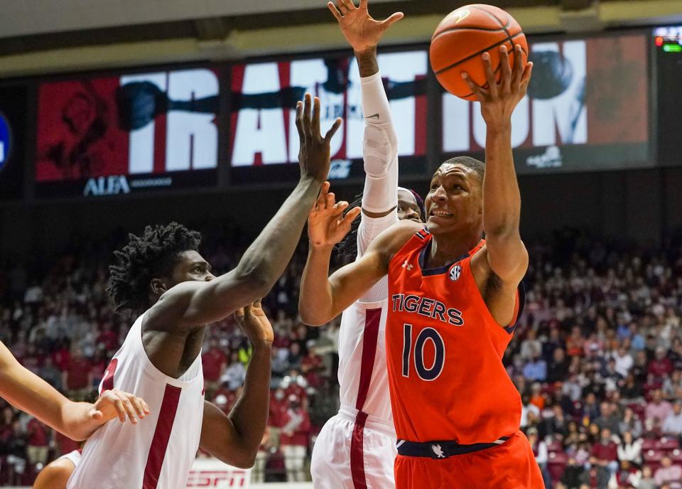 Jan 11, 2022; Tuscaloosa, Alabama, USA; Auburn Tigers forward Jabari Smith (10) shoots against the Alabama Crimson Tide during the first half at Coleman Coliseum. Mandatory Credit: Marvin Gentry-USA TODAY Sports