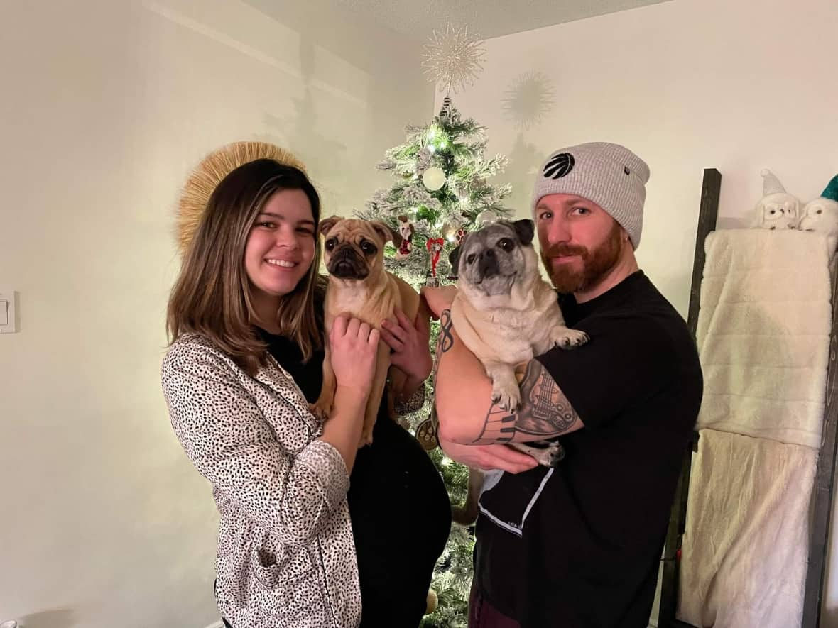 Bowmanville couple Lauren and Mathew Ducey were floored by the support from their local community, who shoveled their driveway and street in droves to get them to the hospital after Lauren's water broke on Monday. (Submitted by Matthew Ducey - image credit)