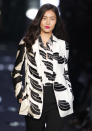 <b>Diane Von Furstenburg AW 13 runway show<br><br></b>DVF is yet another designer giving into monochrome for autumn/winter, with this graphic-print shirt and jacket emphasized by a red pout.<br><br>©Rex<b><br></b>