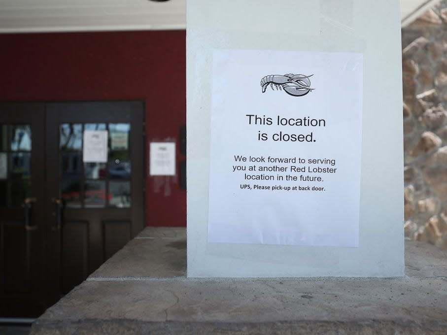 A sign announcing the closure of a Red Lobster restaurant is posted on the front of a Red Lobster restaurant on May 14, 2024 in Fremont, California.