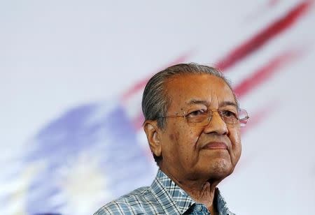 Malaysia's former Prime Minister Mahathir Mohamad attends a meeting of political and civil leaders looking to change the government in Kuala Lumpur, Malaysia, March 27, 2016. REUTERS/Olivia Harris/File photo