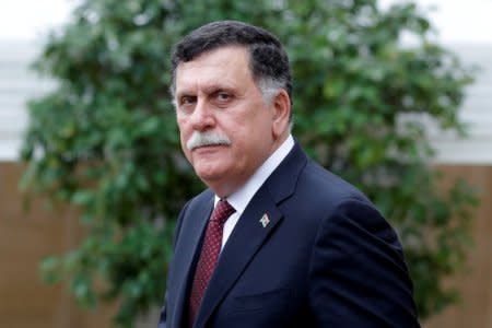 FILE PHOTO: Libyan Prime Minister Fayez al-Sarraj leaves after an international conference on Libya at the Elysee Palace in Paris, France, May 29, 2018.  REUTERS/Philippe Wojazer/File Photo