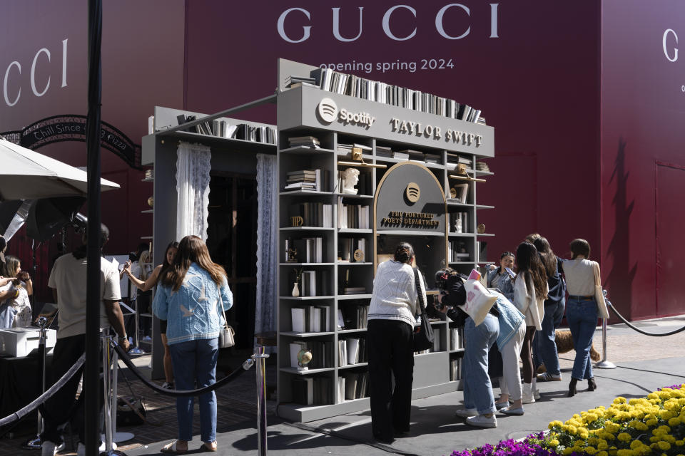 Taylor Swift fans check out a new pop-up opening to celebrate Taylor Swift's upcoming album "The Tortured Poets Department," at the Grove in Los Angeles on Wednesday, April 17, 2024. (AP Photo/Richard Vogel)