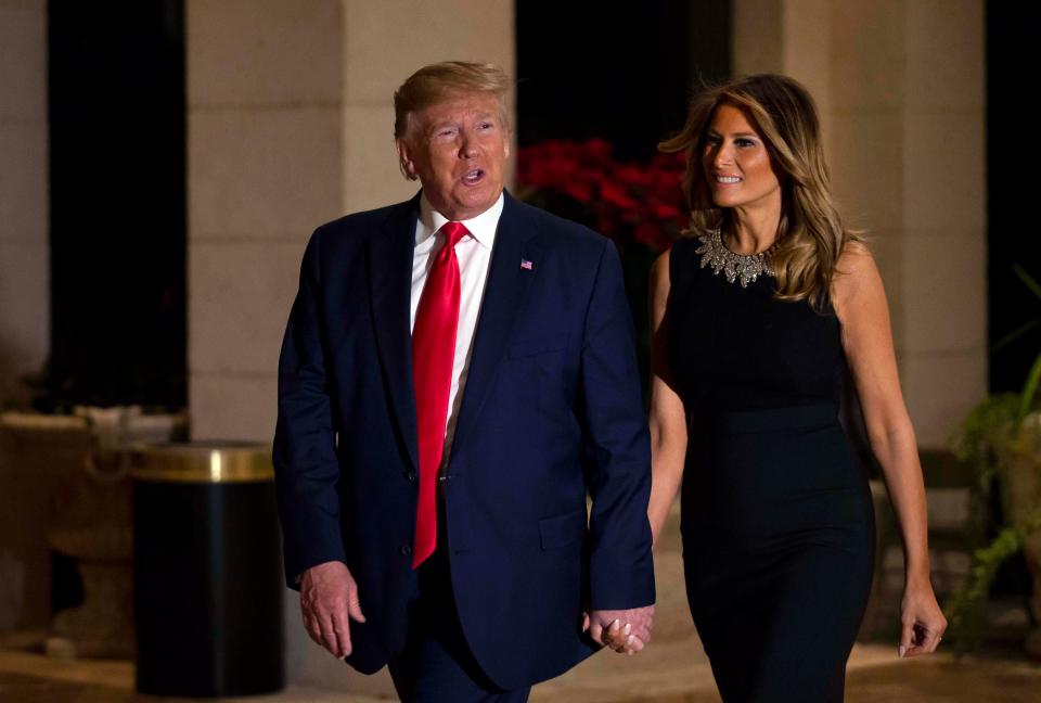 President Donald Trump and first lady Melania arrive for Christmas dinner at the ballroom at Mar-a-Lago in Palm Beach, Dec. 24, 2019. [ALLEN EYESTONE/palmbeachpost.com]