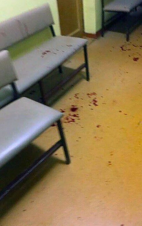 Footage published on Russian media showed blood on the floor of the school - Credit: Vkontakte/east2west news
