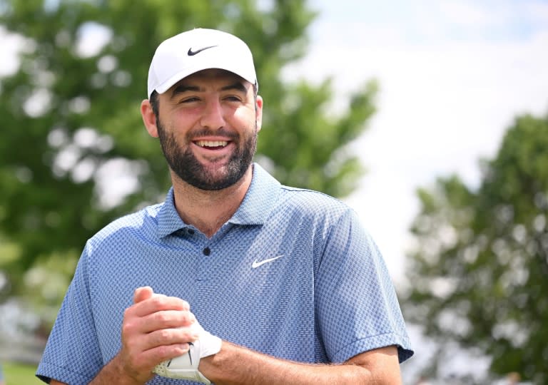 Top-ranked Scottie Scheffler of the United States, a two-time Masters champion, smiles on the practice putting green ahead of the 106th PGA Championship at Valhalla (ROSS KINNAIRD)
