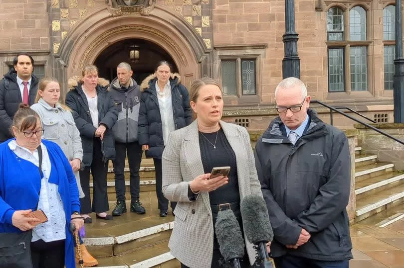 David Carpenter's stepdaughter Claire Chetwynd speaks outside the council house on 22 April 2024