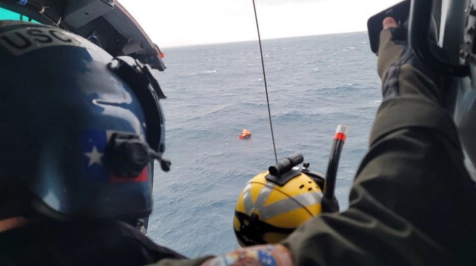 The Coast Guard found the two men after they released a flare, officials say. Photo by Petty Officer 1st Class Ryan Dickinson