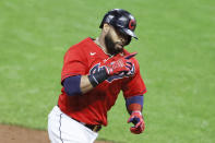 Cleveland Indians' Carlos Santana rounds the bases after hitting a two-run home run off Chicago White Sox pitcher Jace Fry during the fifth inning of a baseball game, Monday, Sept. 21, 2020, in Cleveland. (AP Photo/Ron Schwane)